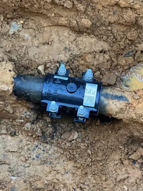 Ring fracture repair on a 3” cast iron water main with repair clamp